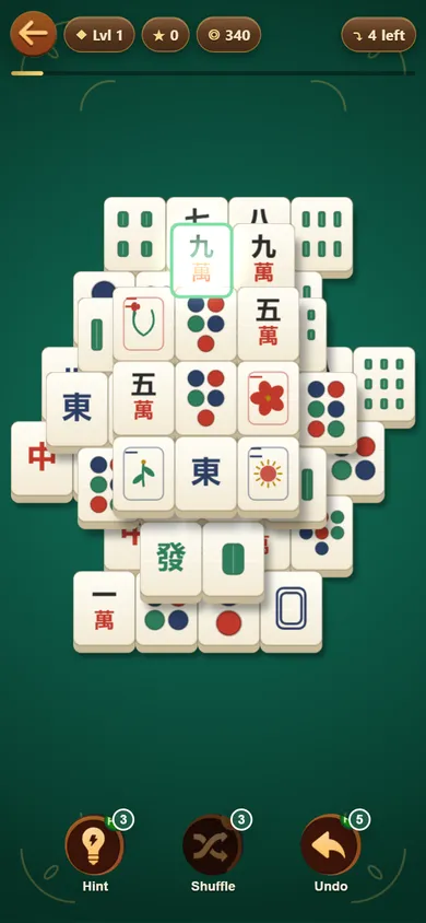 Classic mode in Yila Mahjong: a stacked board on green felt with one free tile selected by a green glow