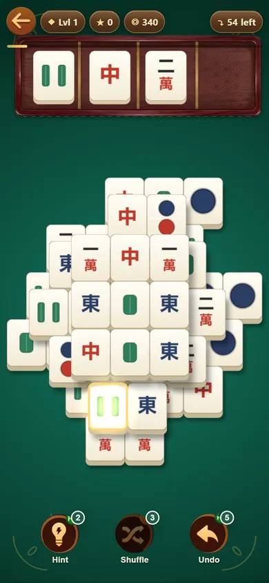 Tray mode after pressing Hint: one tile on the board is outlined in a warm glow